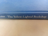 The yellow-lighted bookshop
